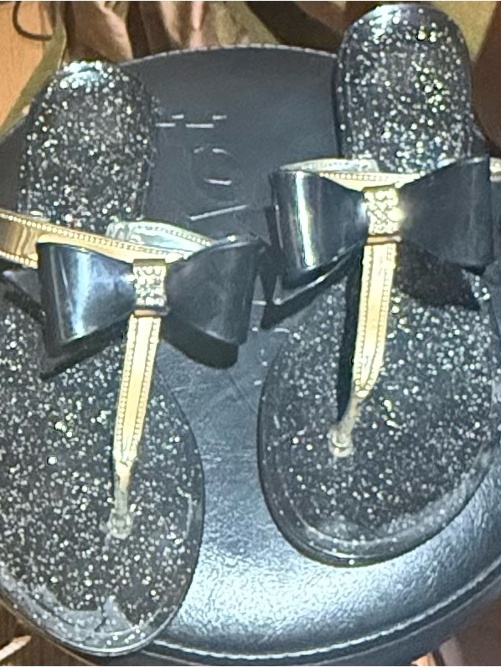 Women’s Bow Thong Sandals in Black with Gold Trim